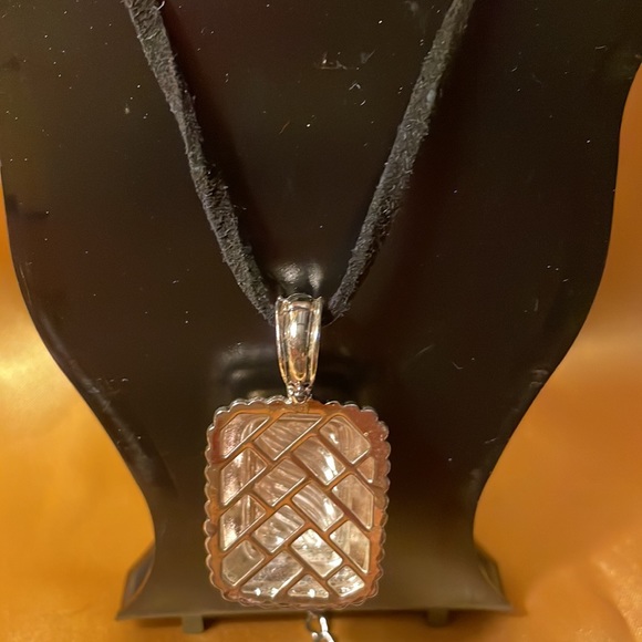 Gold and silver colored pendant on leather like cord strap - Picture 4 of 12